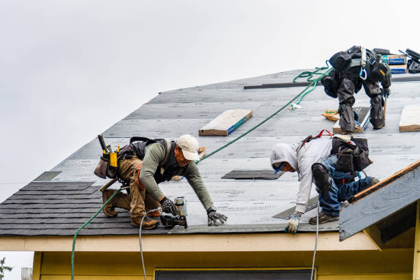 Professional Roofing technician working in Underhill, VT